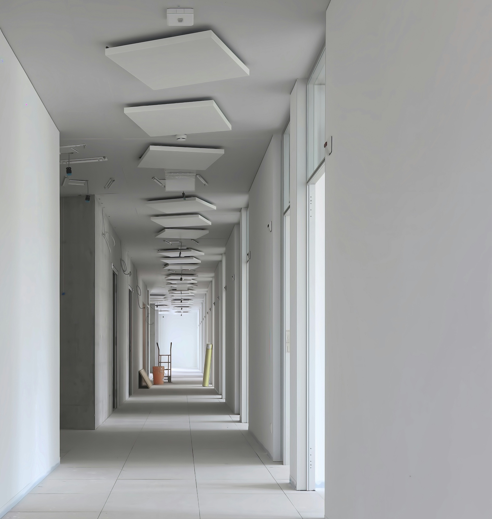 Commercial corridor — finished tile floors and clean ceiling finishes